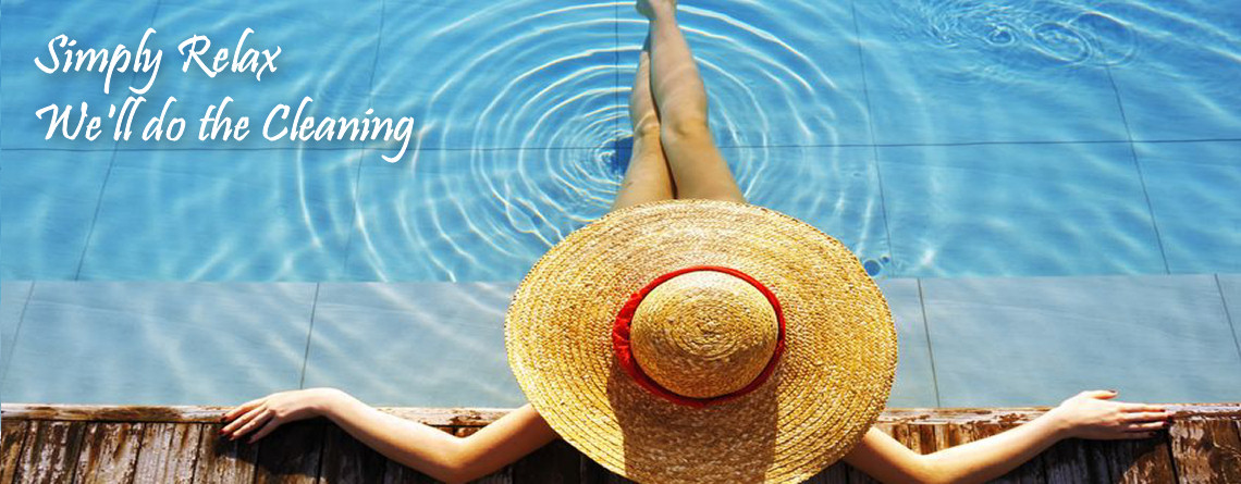 Auckland pool deck at golden hour — clear water maintained by Auckland Pool Services